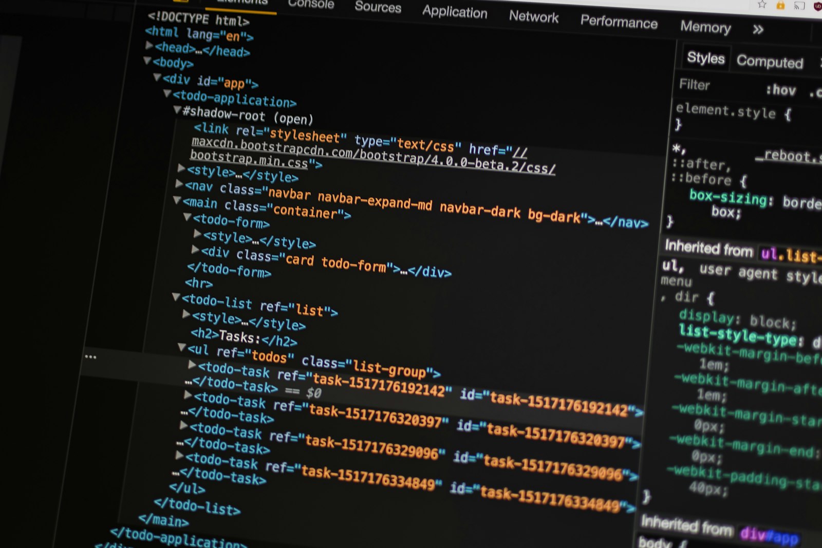 Developer inspecting application code and DOM in browser developer tools